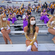 The LSU Golden Girls dance team sit spaced apart wearing masks before a game between the Tigers and the Mississippi State.